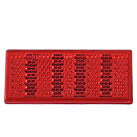 Červená odrazka 76x34 mm s lepiacou páskou